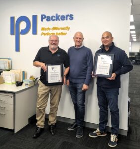 Founder and CEO Clem Rowe presents Francis Ford, Australian Director and Group Engineering Director, and Howard Kenworthy, our Commercial Director, with 20 year service gifts